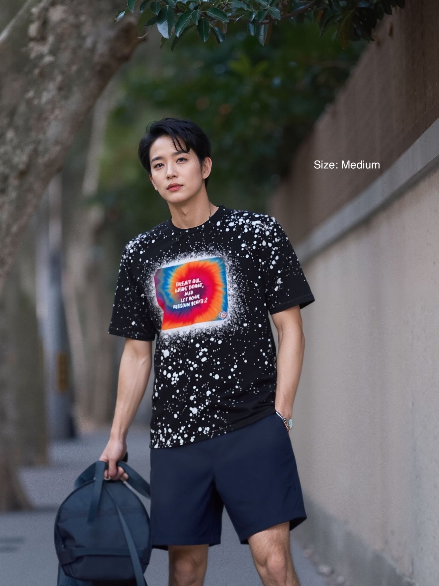 Black personalised bleached splatter t-shirt with custom design - male model
